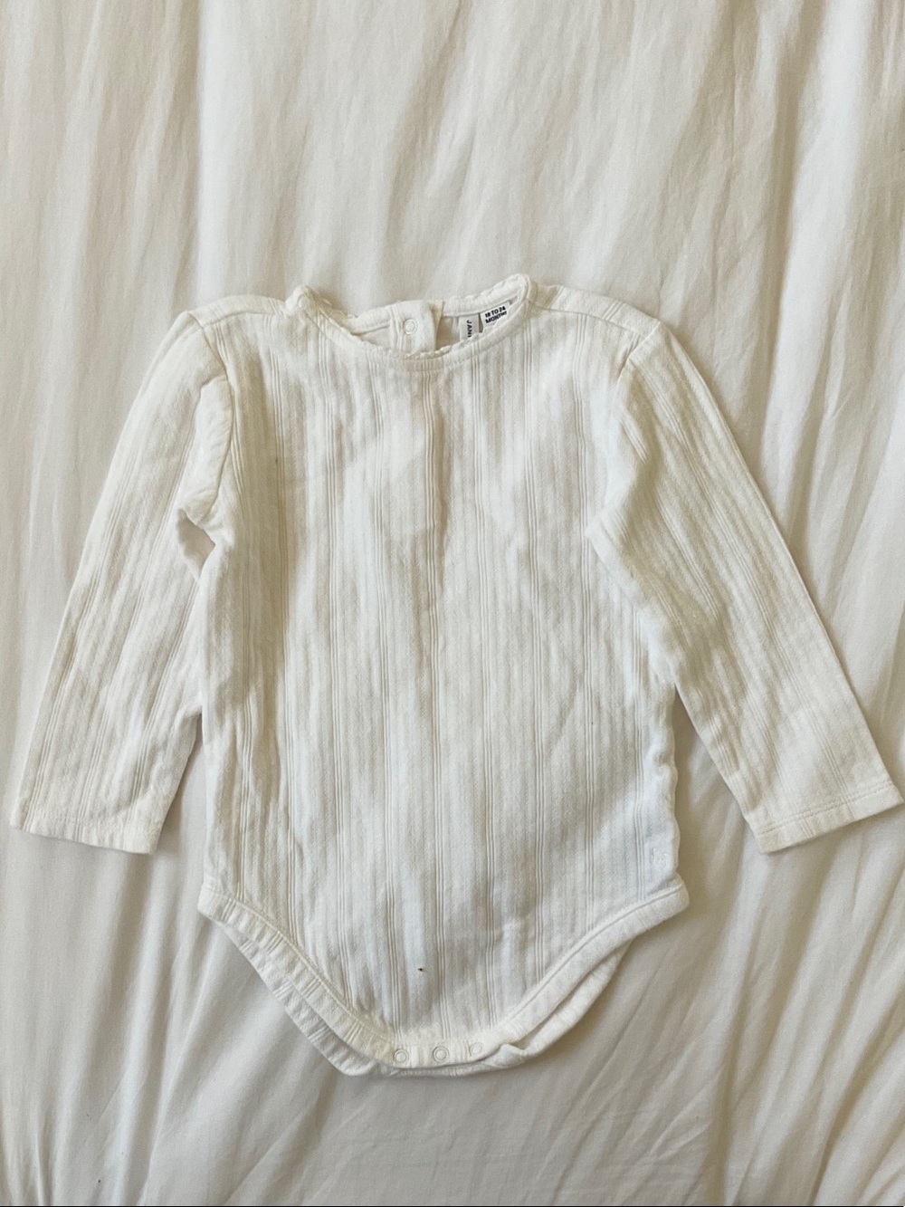 Uniqlo Cream Ribbed Long-Sleeve Baby Bodysuit